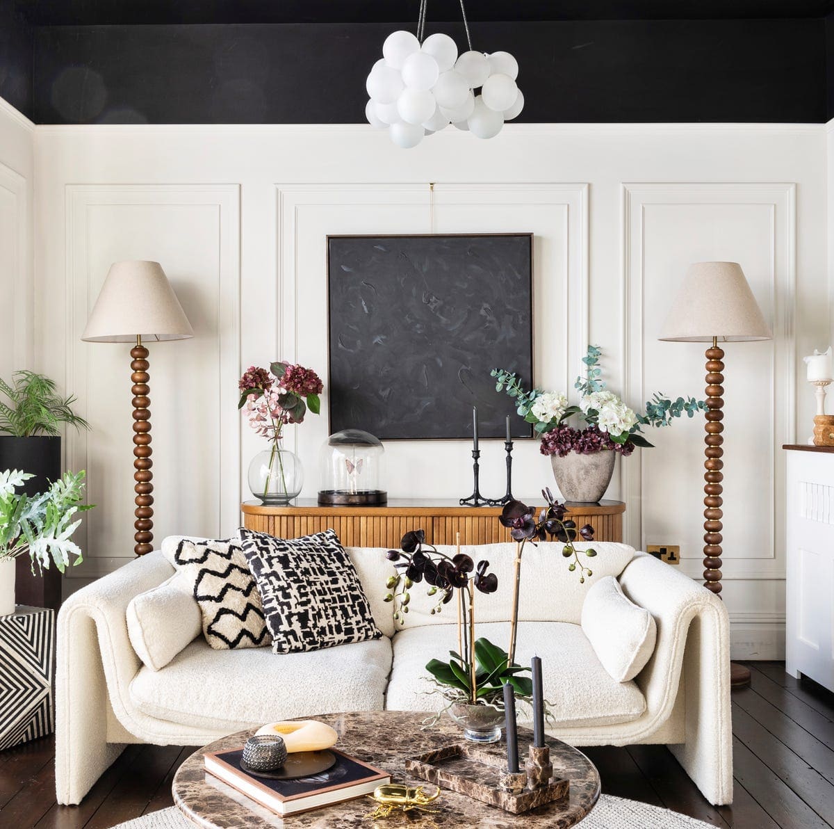 Panelled and refurbished living room by Construction Eye Ltd
